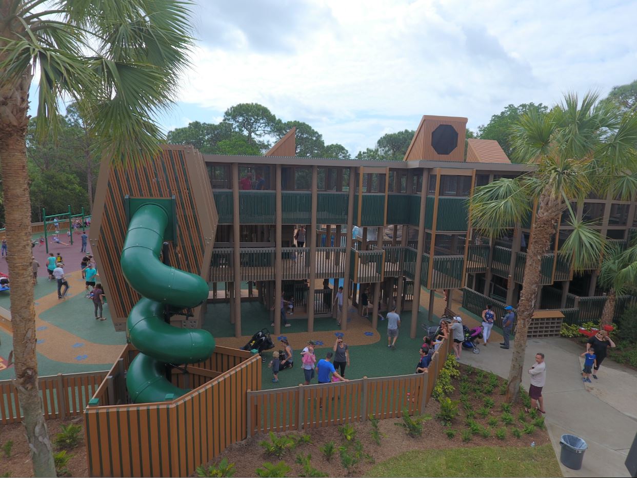 Kendall smiling on a carousel
